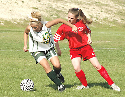 <FONT SIZE=7>Bunn Outburst</FONT><br><FONT SIZE=4>Ladycats break open tight game with solid 2nd-half</font>